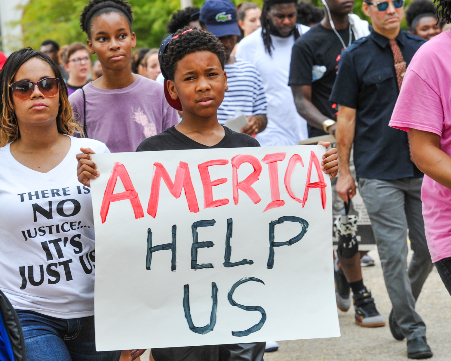 PHOTO: Protesters march to the state Capitol in Baton Rouge, Louisiana, July 10, 2016. People are protesting the shooting death of a black man, Alton Sterling, by two white police officers at a convenience store parking lot last week.