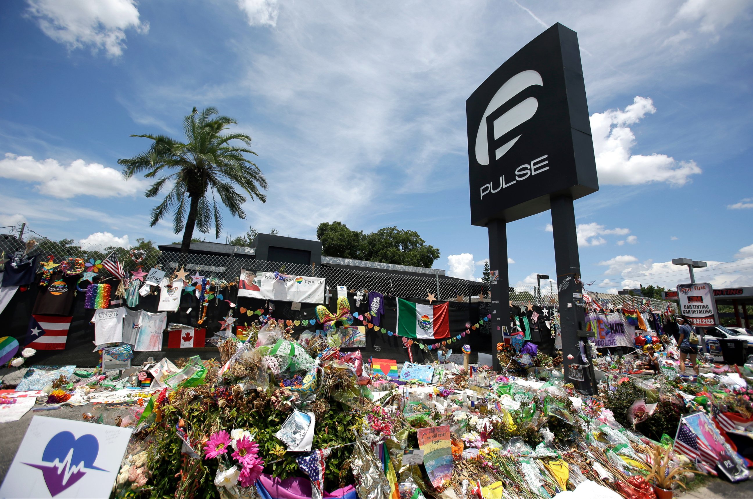 PHOTO: Photo taken shows a makeshift memorial outside the Pulse nightclub in Orlando, Fla., July 11, 2016.