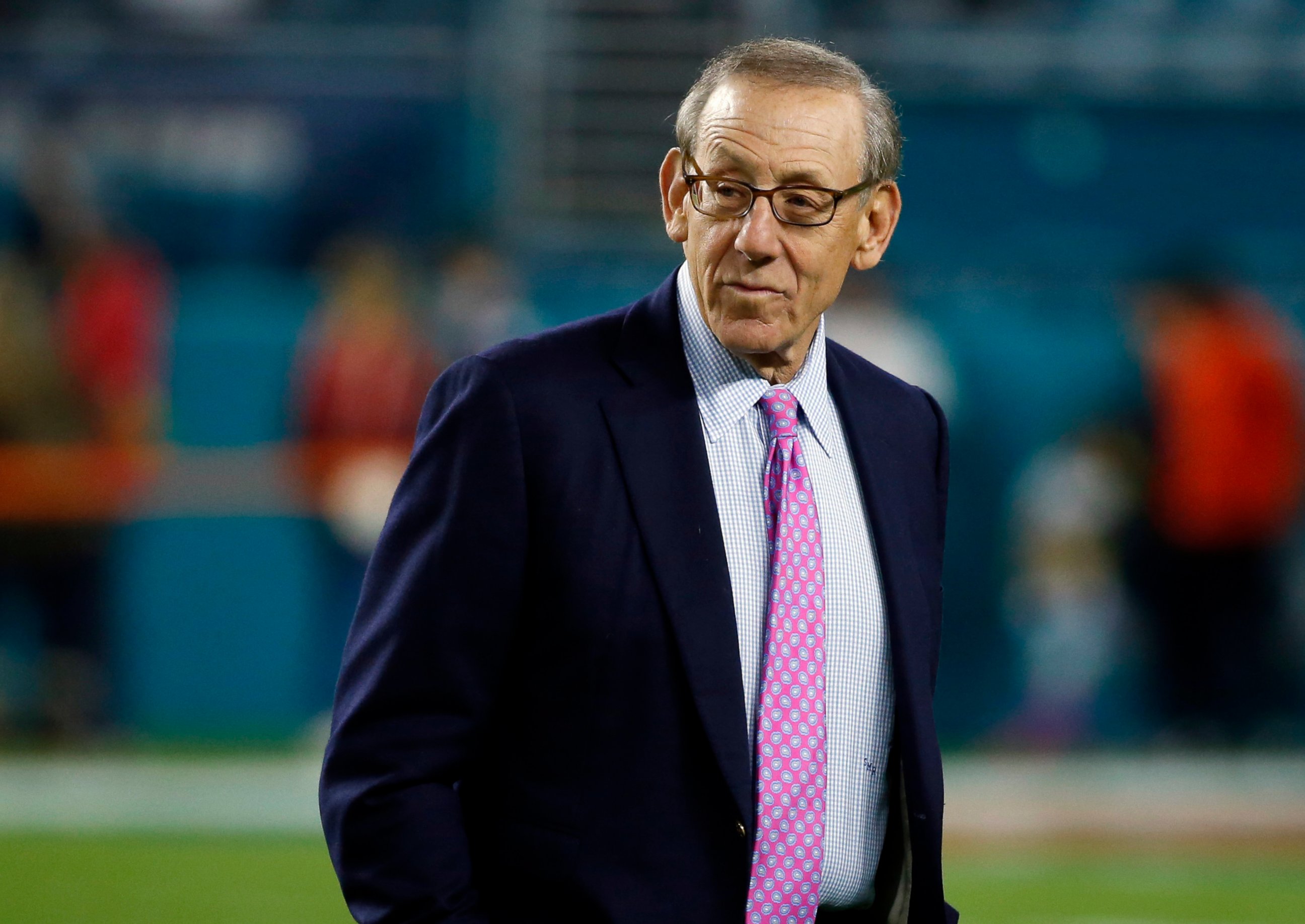PHOTO: Miami Dolphins owner Stephen M. Ross watches his team before an NFL football game against the New England Patriots in Miami Gardens, Fla. 