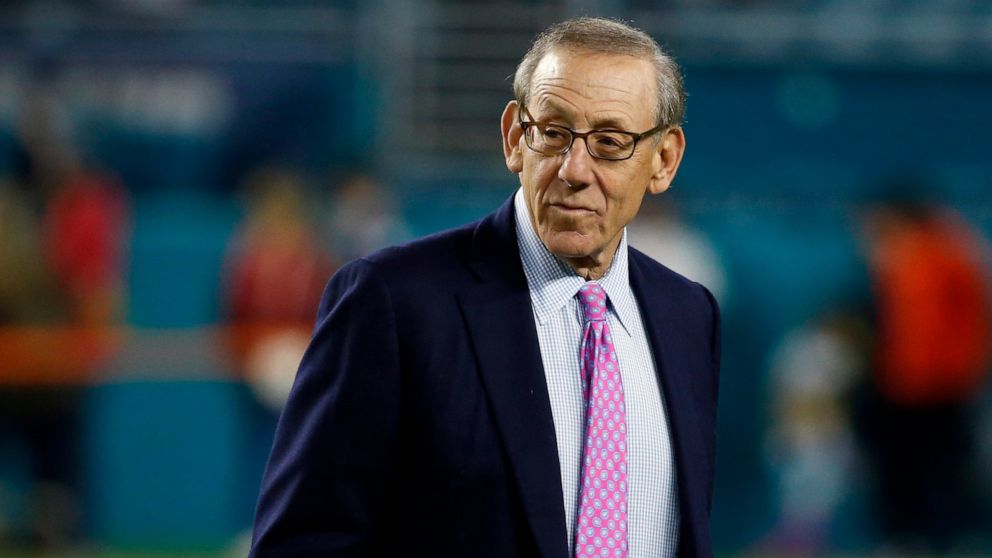 PHOTO: Miami Dolphins owner Stephen M. Ross watches his team before an NFL football game against the New England Patriots in Miami Gardens, Fla. 
