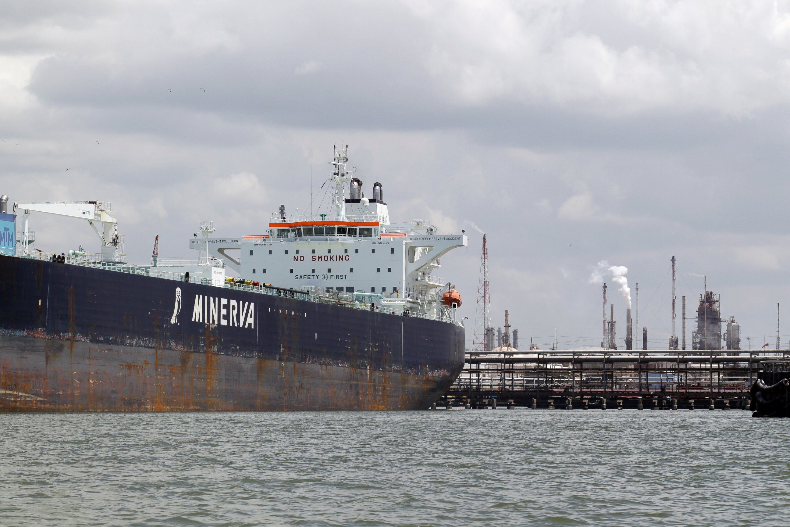 PHOTO: An oil tanker is docked at the Exxon Mobile Baytown complex along the Houston Ship Channel, June 2011 in Baytown, Texas.