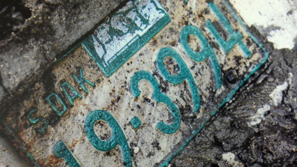 PHOTO: A license plate from the 1960 Studebaker unearthed in September, 2013.