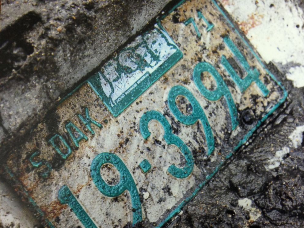 PHOTO: A license plate from the 1960 Studebaker unearthed in September, 2013.