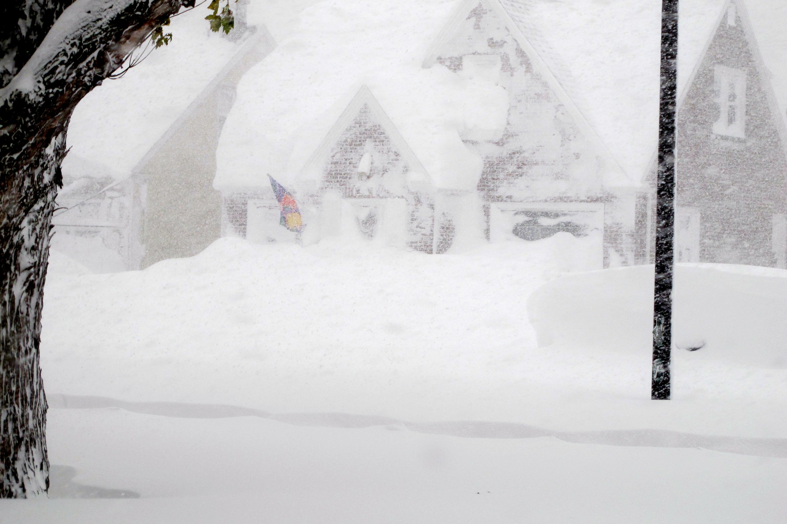 PHOTO: A house is obscured by wind-blown, lake-effect snow, Nov. 18, 2014 in Buffalo, N.Y.