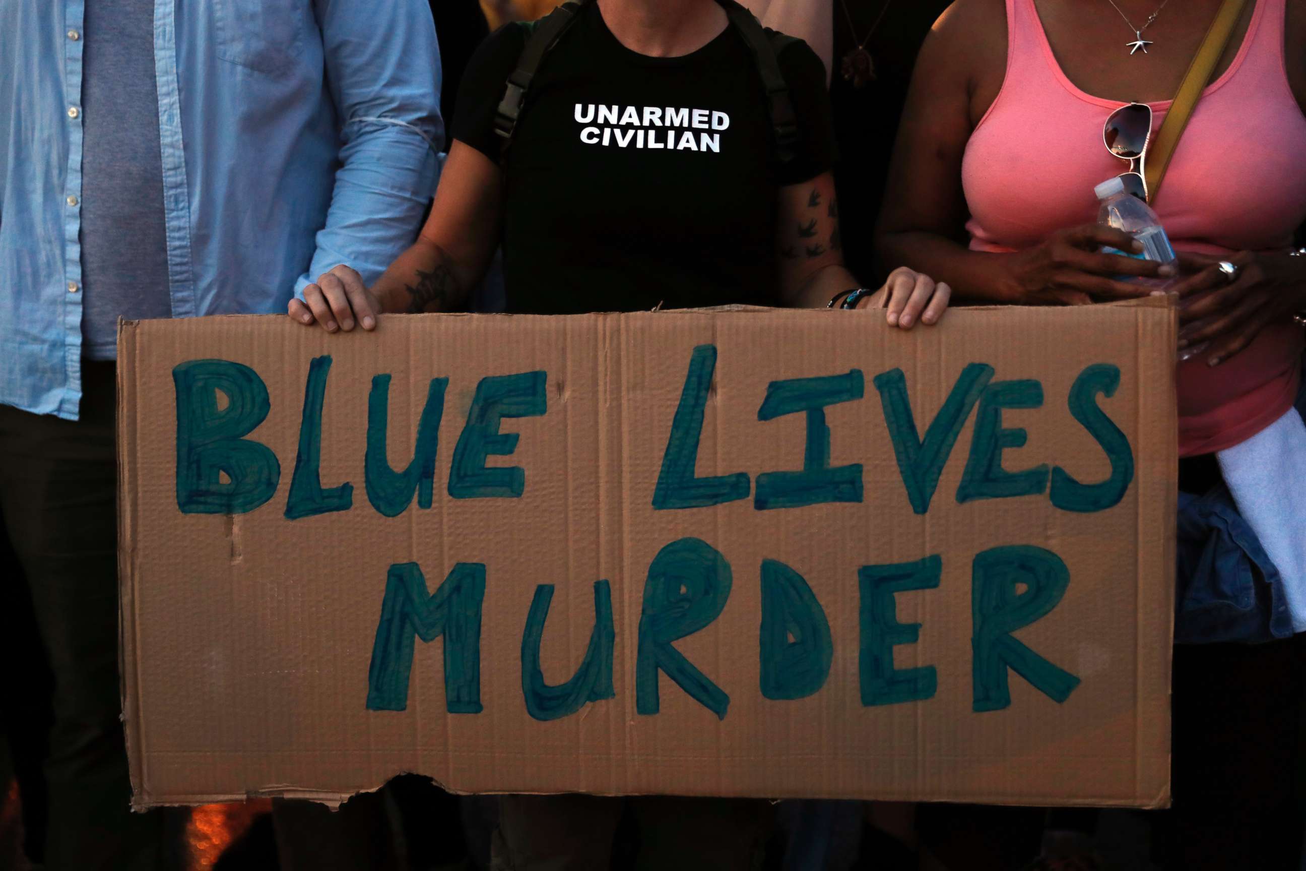 PHOTO: A protester holds a sign while marching in response to a not guilty verdict in the trial of former St. Louis police officer Jason Stockley Saturday, Sept. 16, 2017, in St. Louis.