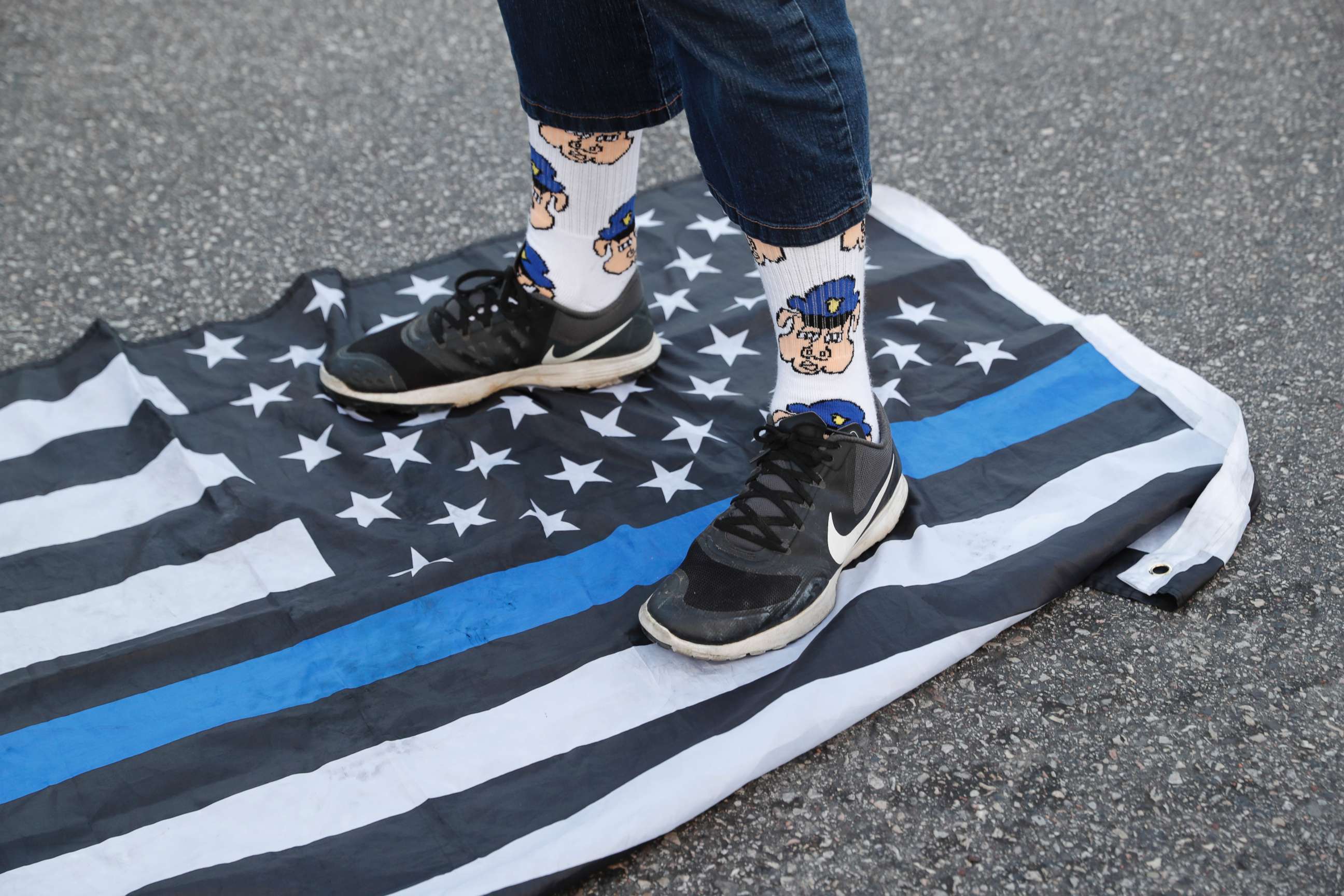 PHOTO: A protester steps on a flag Saturday, Sept. 16, 2017 in University City, Mo., in response to a not guilty verdict in the trial of former St. Louis Police officer Jason Stockley. 