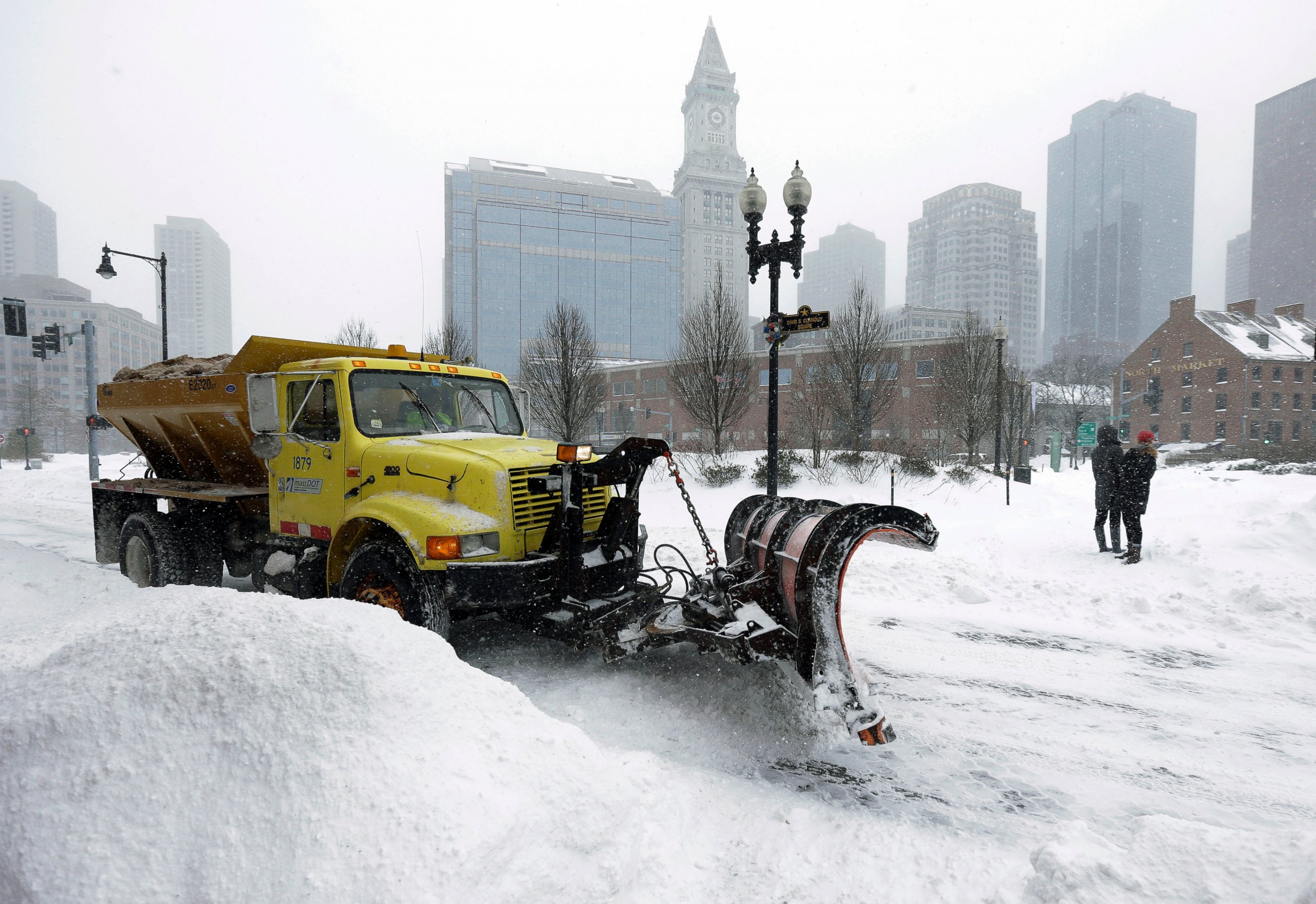 PHOTO: A snowplow clears a street near Quincy Market, Jan. 27, 2015, in Boston.