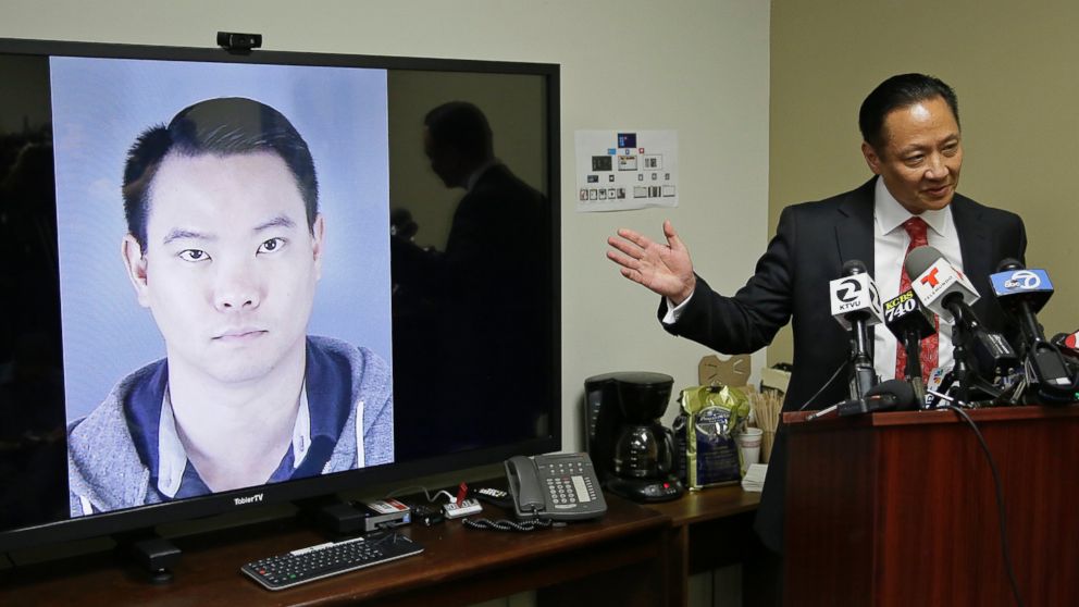 San Francisco Public Defender Jeff Adachi gestures while standing beside a picture of police officer Jason Lai during a news conference on April 26, 2016, in San Francisco. 