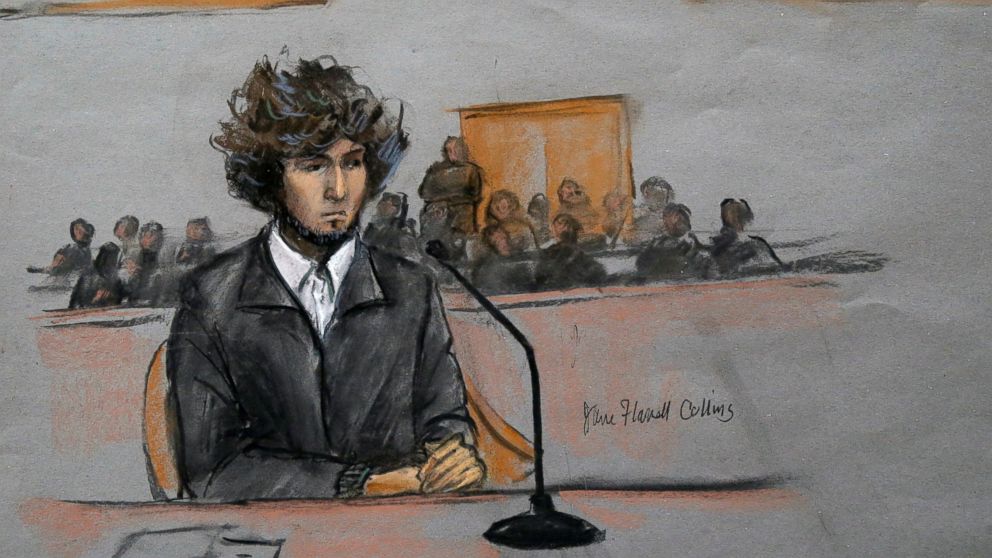 In this courtroom sketch, Boston Marathon bombing suspect Dzhokhar Tsarnaev is seen sitting in federal court in Boston, Dec. 18, 2014. 