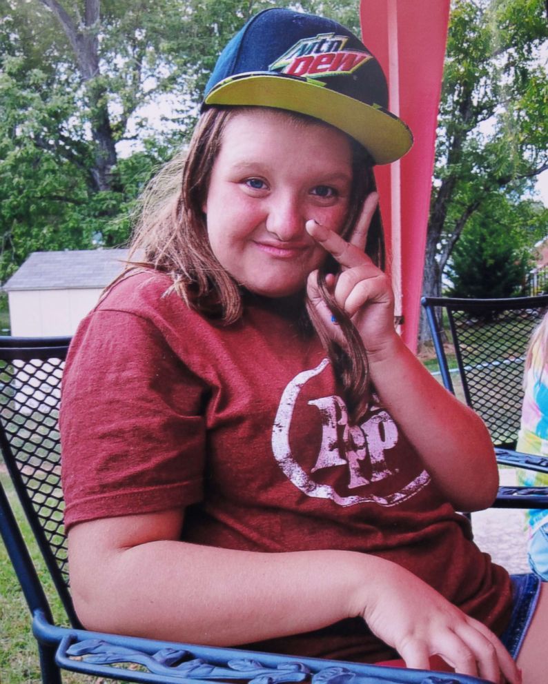PHOTO: In this 2015 photo provided by Tammy Weeks, her daughter, Nicole Lovell, flashes a peace sign in Blacksburg, Va. The 13-year-old girl was found dead just across the state line in Surry County, N.C.