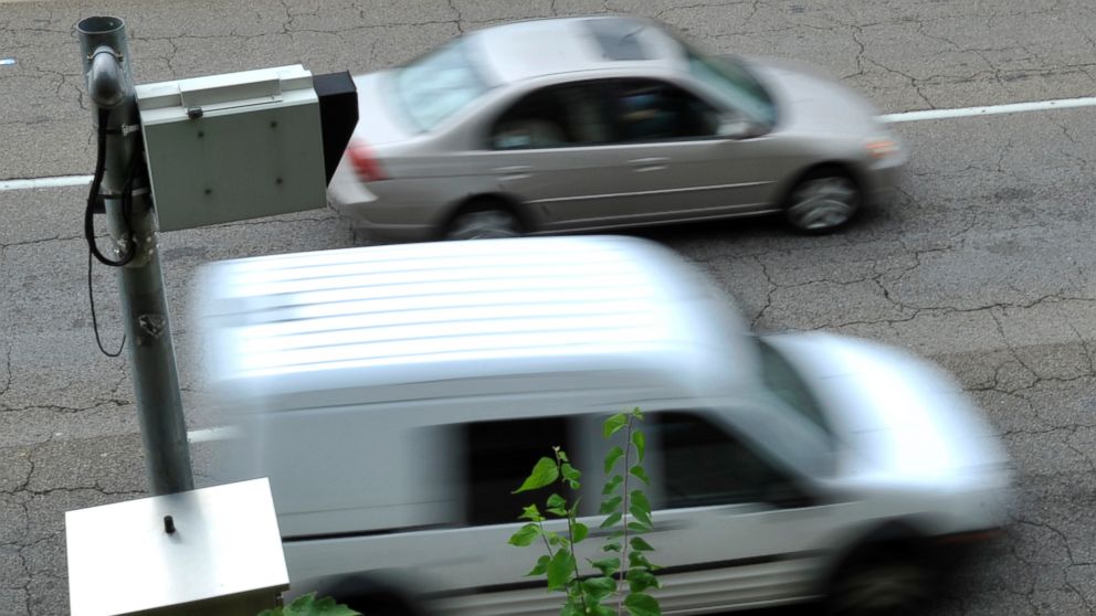 Cars move past a traffic camera on Sep. 6, 2011 in Knoxville, Tenn.