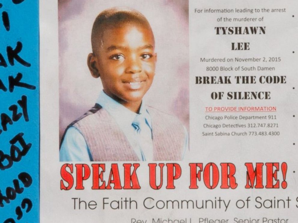 PHOTO: A reward sign and messages hang on Nov. 4, 2015, near where Tyshawn Lee was fatally shot in the Auburn Gresham neighborhood of Chicago. 