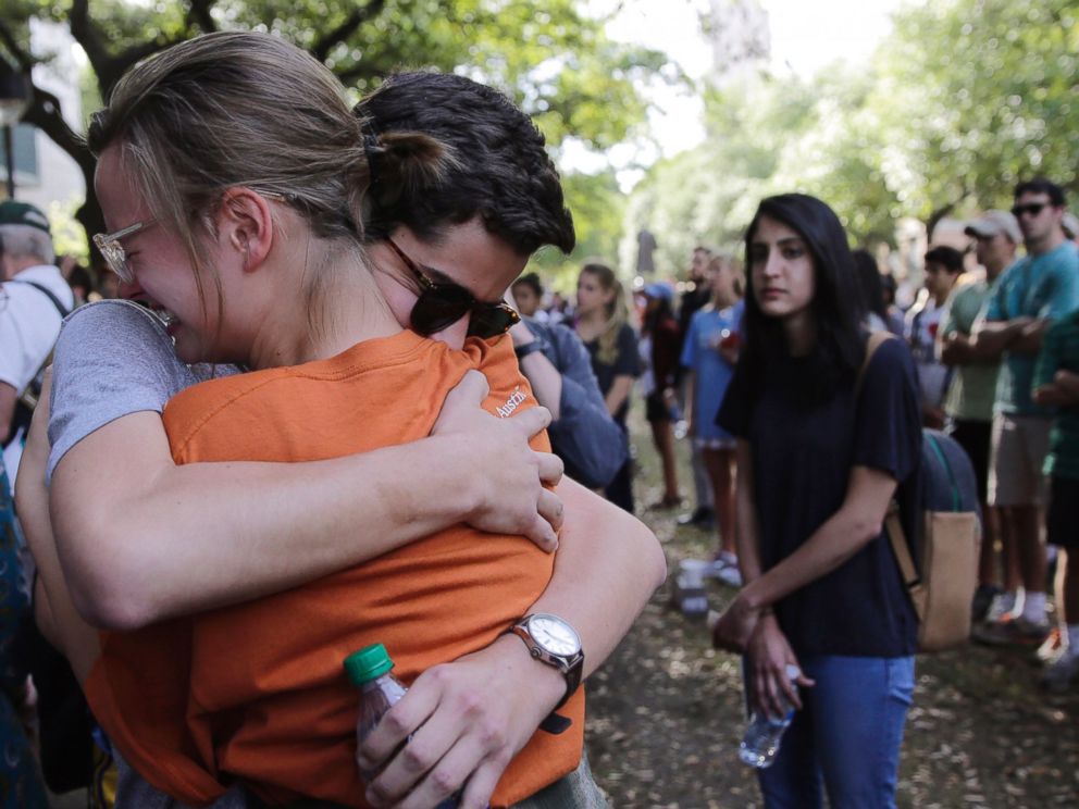 PHOTO: University of Texas students embrace during a gathering for fellow student Haruka Weiser on campus, April 7, 2016, in Austin, Texas.