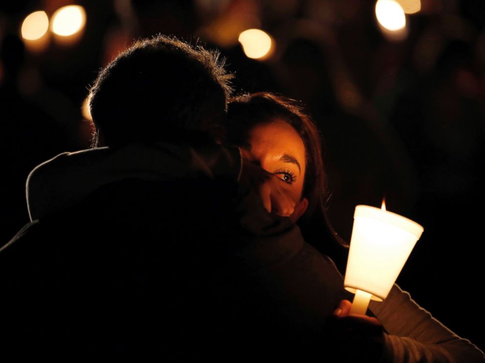 PHOTO: Umpqua Community College student Nichole Zamarripa, right, is consoled during a candle light vigil for those killed during a fatal shooting at the school, Oct. 1, 2015, in Roseburg, Ore.