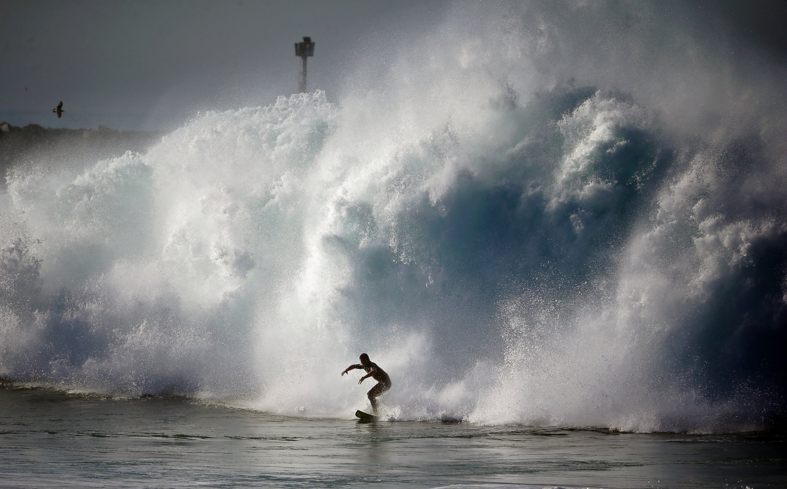 PHOTO: A surfer rides a wave at the wedge in Newport Beach, Calif., Aug. 27, 2014.