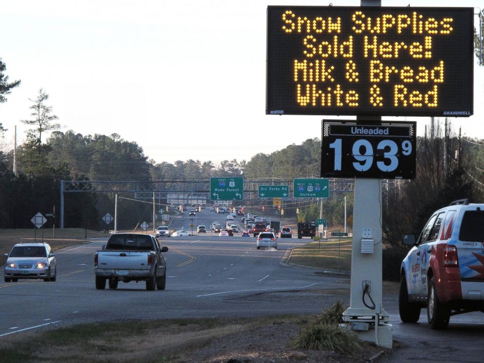 PHOTO: A convenience store in Raleigh, N.C., advertises the essentials as a winter storm threatens to dump the first big snow of the season Jan. 21, 2016.