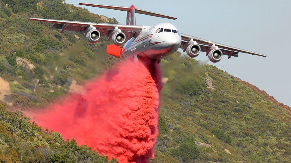 PHOTO: A British Aerospace BAe-146 belonging to Neptune Aviation makes a Phos-Chek drop, June 18, 2016, on wildfires in Santa Barbara County, Calif.