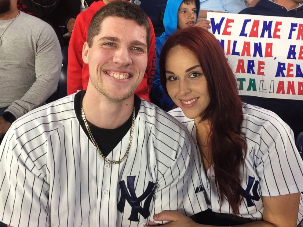 PHOTO: Andrew Fox, left, and Heather Terwilliger sit in the stands at Yankee Stadium, on Sept. 27, 2016, in New York City. 