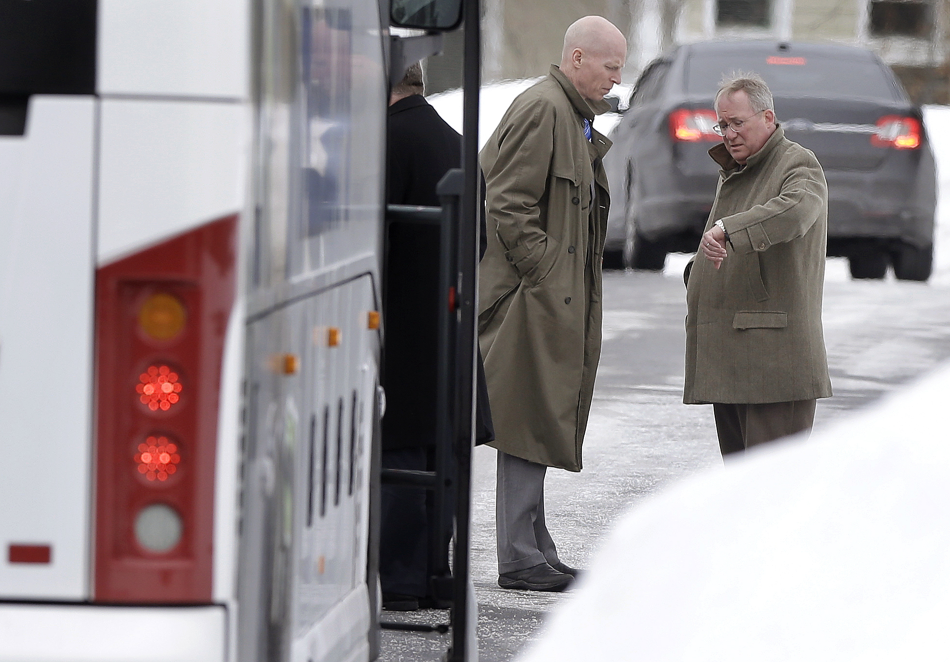 PHOTO: Massachusetts assistant District Attorneys William McCauley, left, and Patrick Bomberg, right, prepare to depart the North Attleborough, Mass., home of former New England Patriots football player Aaron Hernandez, Feb. 6, 2015.