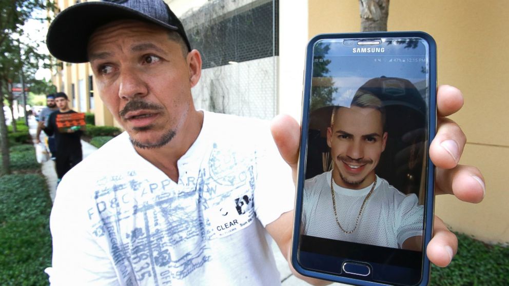 PHOTO: Angel Mendez holds up a cell phone photo trying to get information about his brother Jean C. Mendez that was at the Pulse Nightclub where a shooting involving multiple fatalities occurred, June 12, 2016, in Orlando, Fla. 