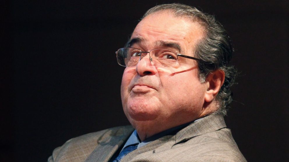 Supreme Court justice Antonin Scalia looks into the balcony before addressing the Chicago-Kent College Law justice in Chicago, Oct. 18, 2011.