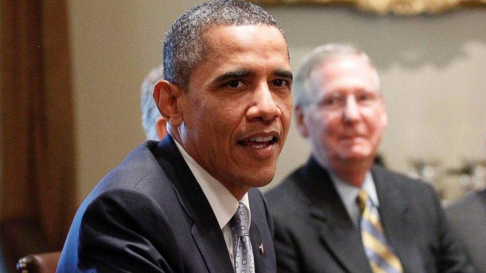 PHOTO: Senate Minority Leader Mitch McConnell of Ky. looks on at right, as President Barack Obama meets with Congressional leaders regarding the debt ceiling, July 13, 2011, in the Cabinet Room of the White House in Washington. 