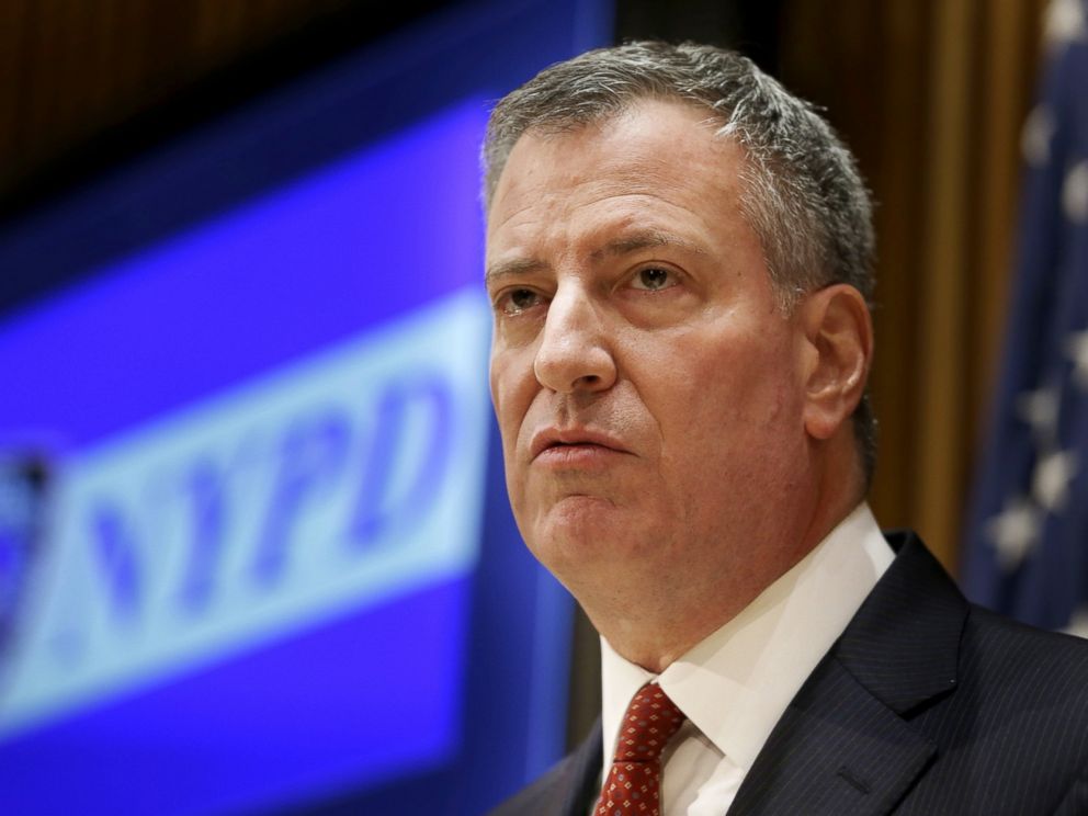 PHOTO: New York City Mayor Bill de Blasio listens during a news conference at police headquarters in New York, Dec. 22, 2014.