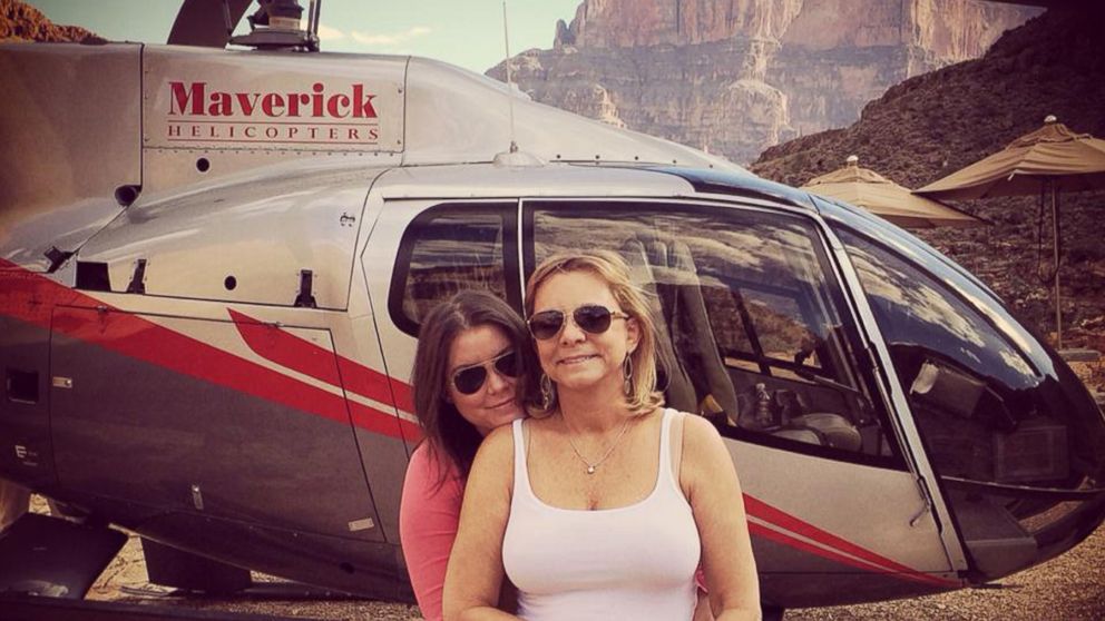 PHOTO: Brittany Maynard, left, hugs her mother, Debbie Ziegler, next to a helicopter at the Grand Canyon National Park in Arizona, Oct. 21, 2014. 