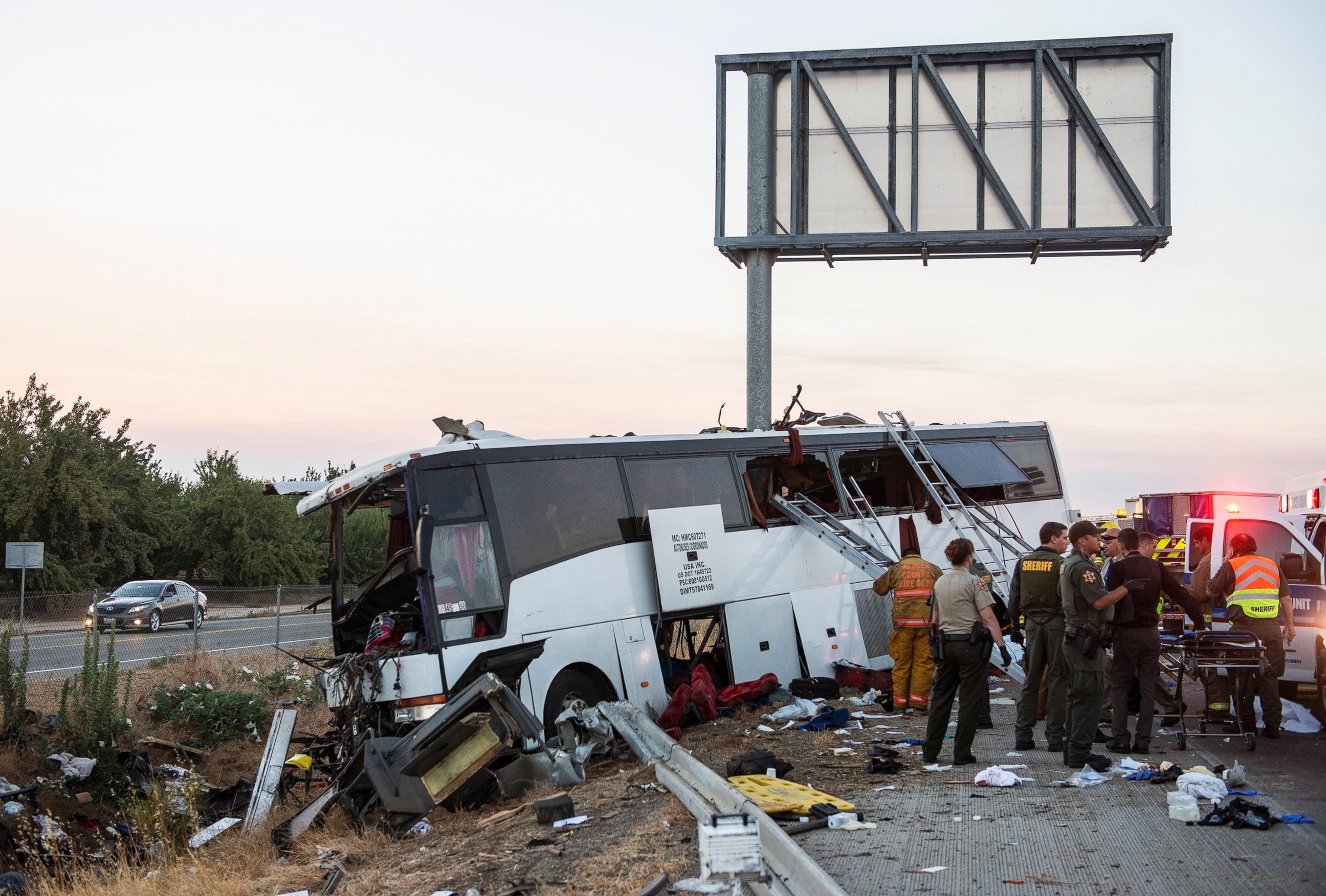 PHOTO: Rescue crews work at the scene of a charter bus crash on northbound Highway 99 between Atwater and Livingston, California, Aug. 2, 2016.