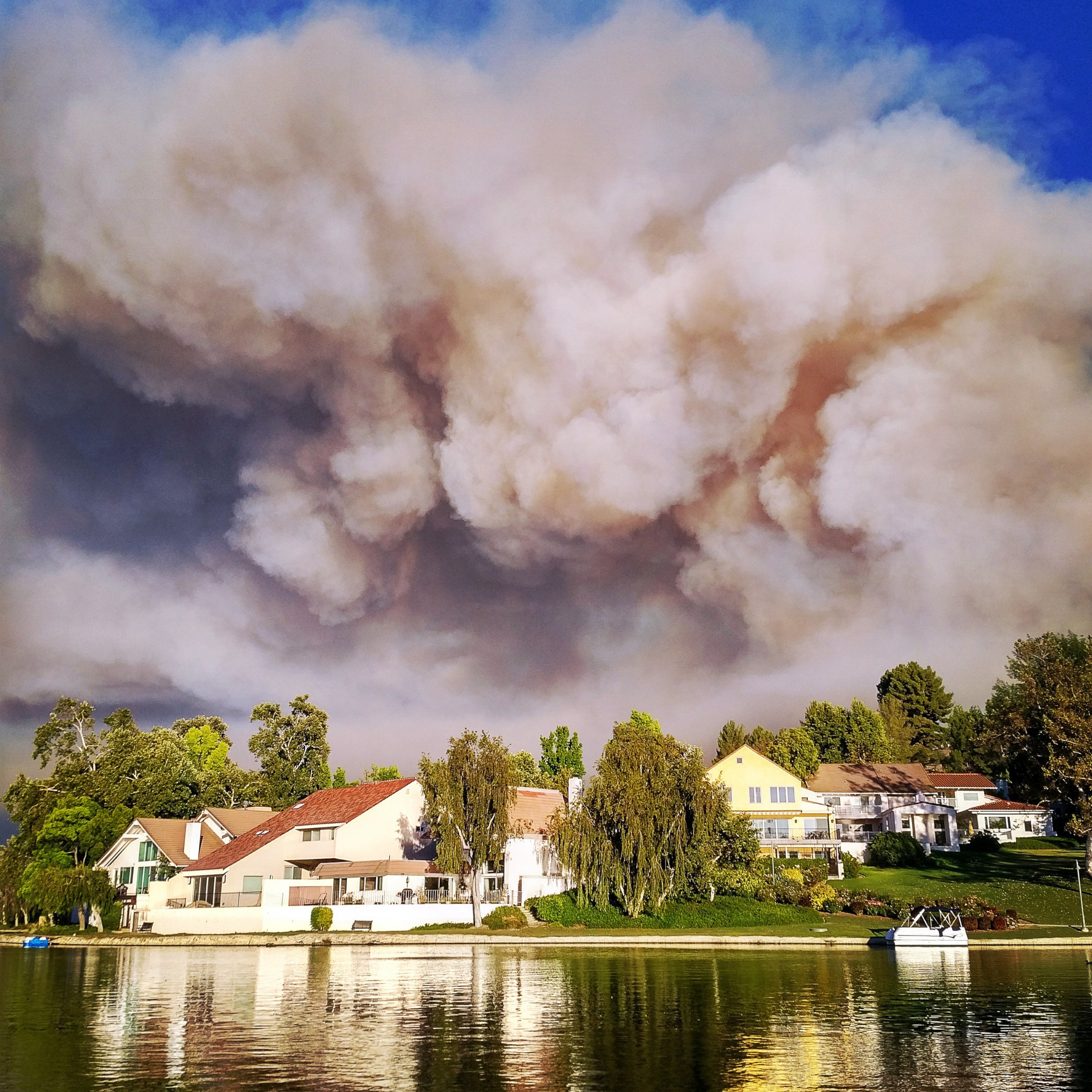 PHOTO: This photo provided by Matthew Dangerfield shows billowing smoke from the fire in Calabasas, Calif., as the clouds passed over the homes of Park Calabasas, June 4, 2016. 