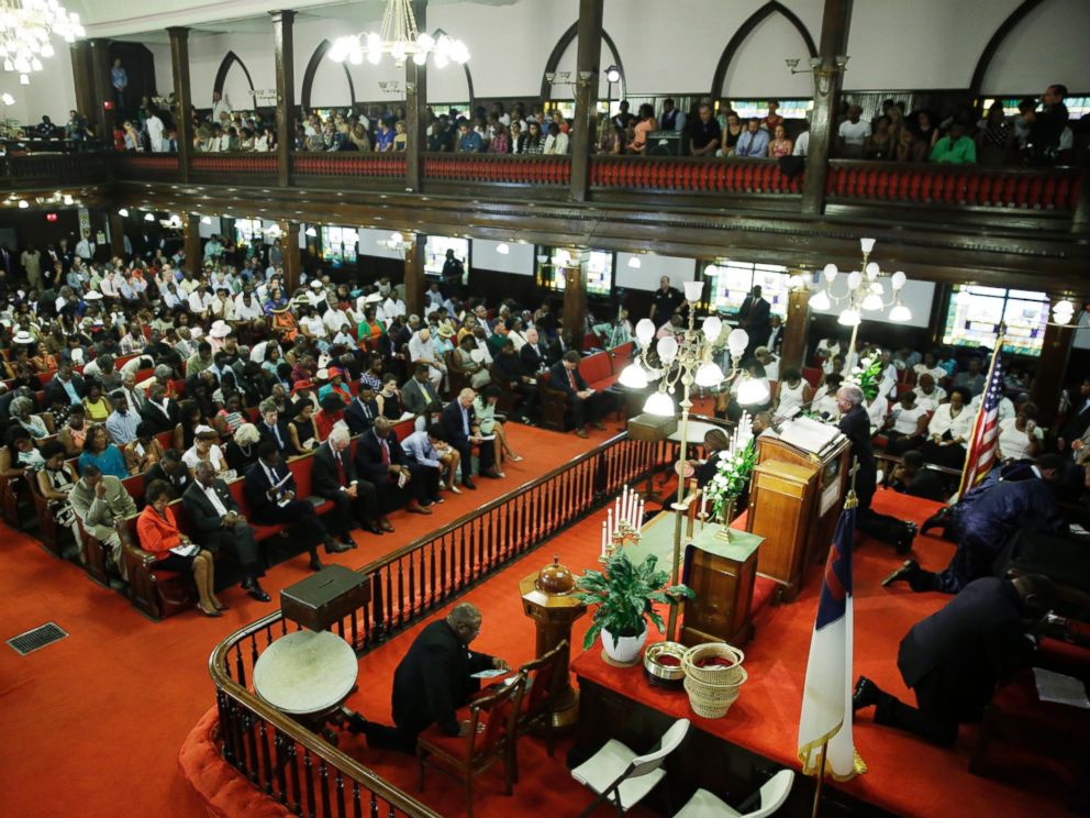 PHOTO: Parishioners prays at the Emanuel A.M.E. Church four days after a mass shooting that claimed the lives of its pastor and eight others, June 21, 2015, in Charleston, S.C.