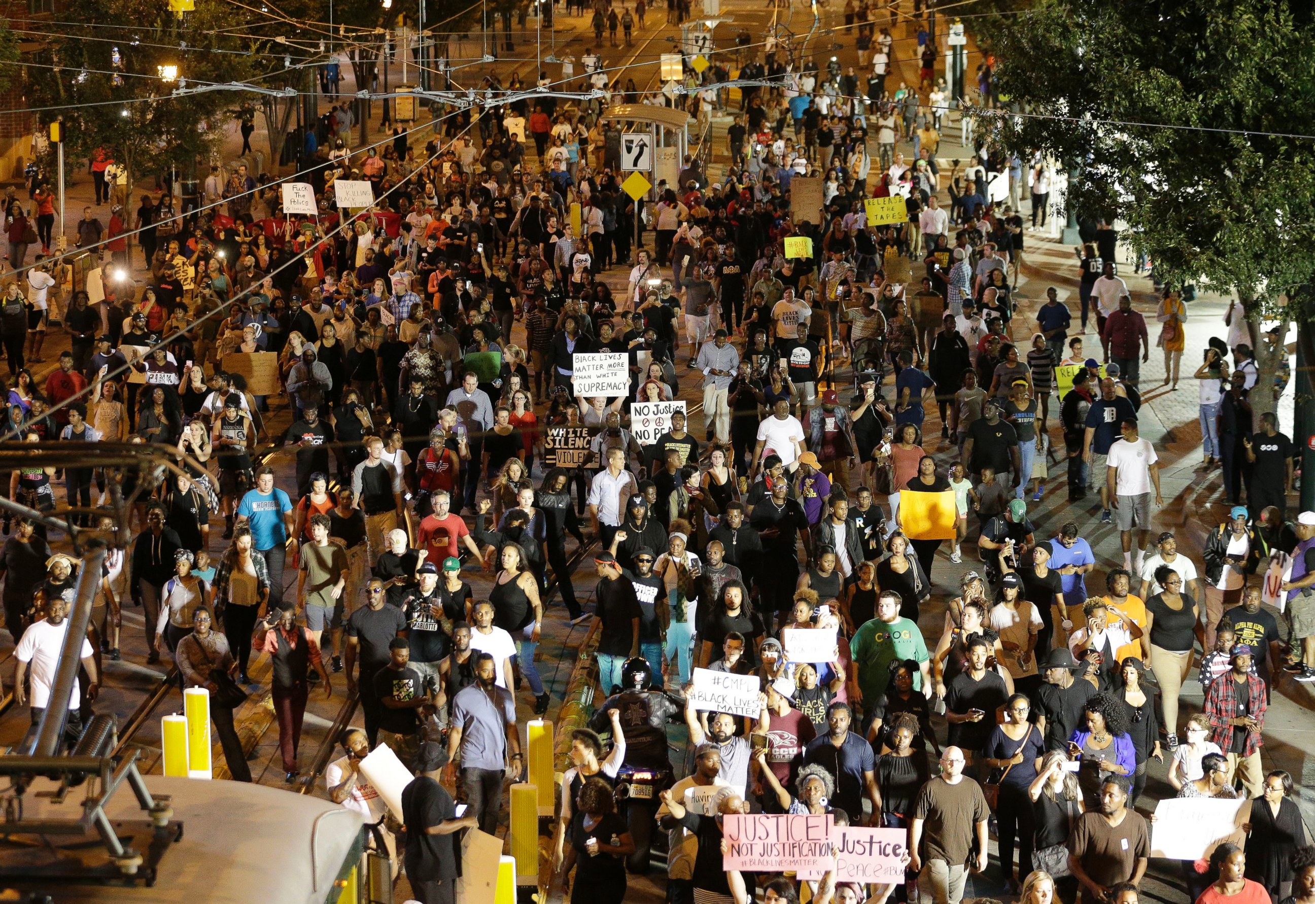 PHOTO: Demonstrators protest Tuesday's fatal police shooting of Keith Lamont Scott in Charlotte, North Carolina on Sept. 21, 2016. Protesters rushed police in riot gear at a downtown Charlotte hotel and officers have fired tear gas to disperse the crowd. 