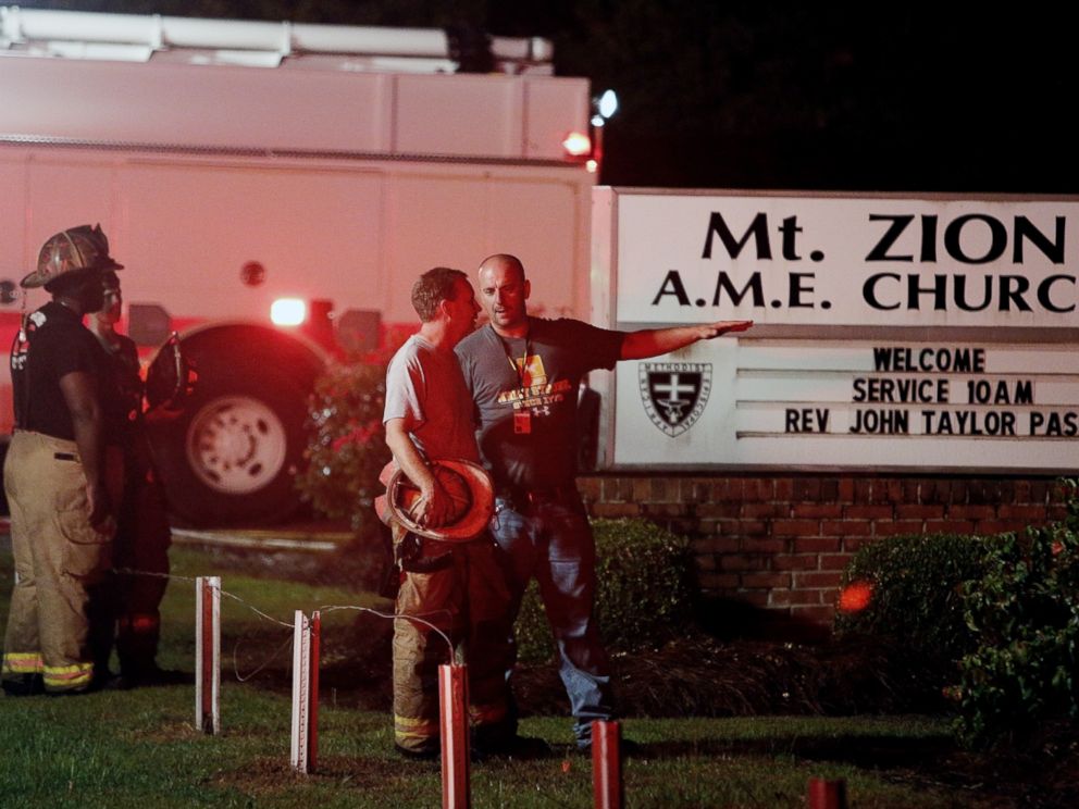 PHOTO: Public safety personnel talk outside Mount Zion African Methodist Episcopal church, June 30, 2015, in Greeleyville, S.C.