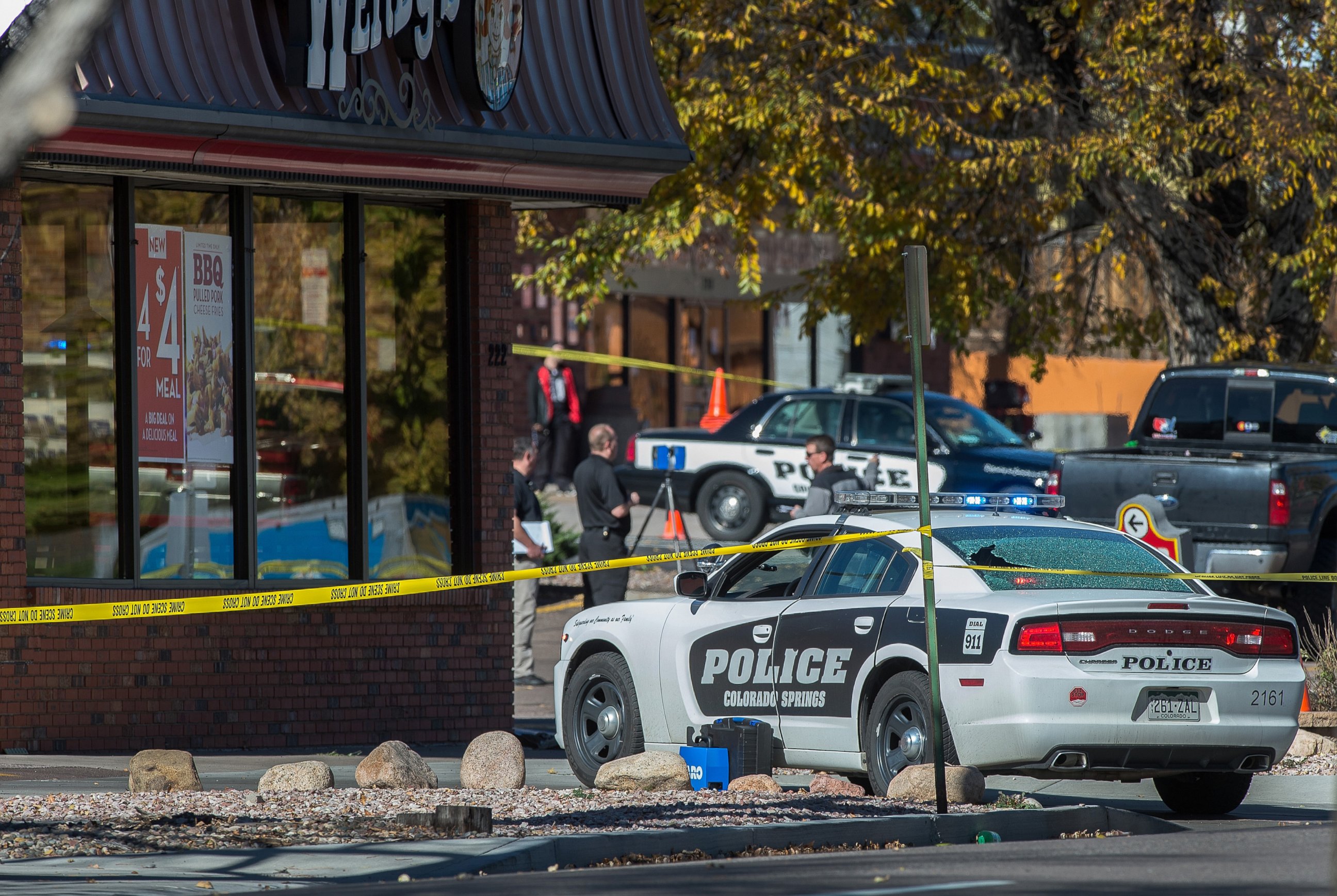PHOTO: The rear window of a Colorado Springs Police car is shattered after a shooting, Oct. 31, 2015, in Colorado Springs, Colo. 