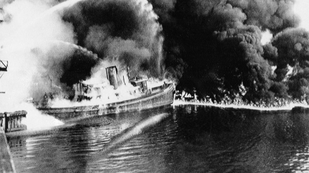 PHOTO: A fire tug fights flames on the Cuyahoga River near downtown Cleveland, where oil and other industrial wastes caught fire June 25, 1952. 