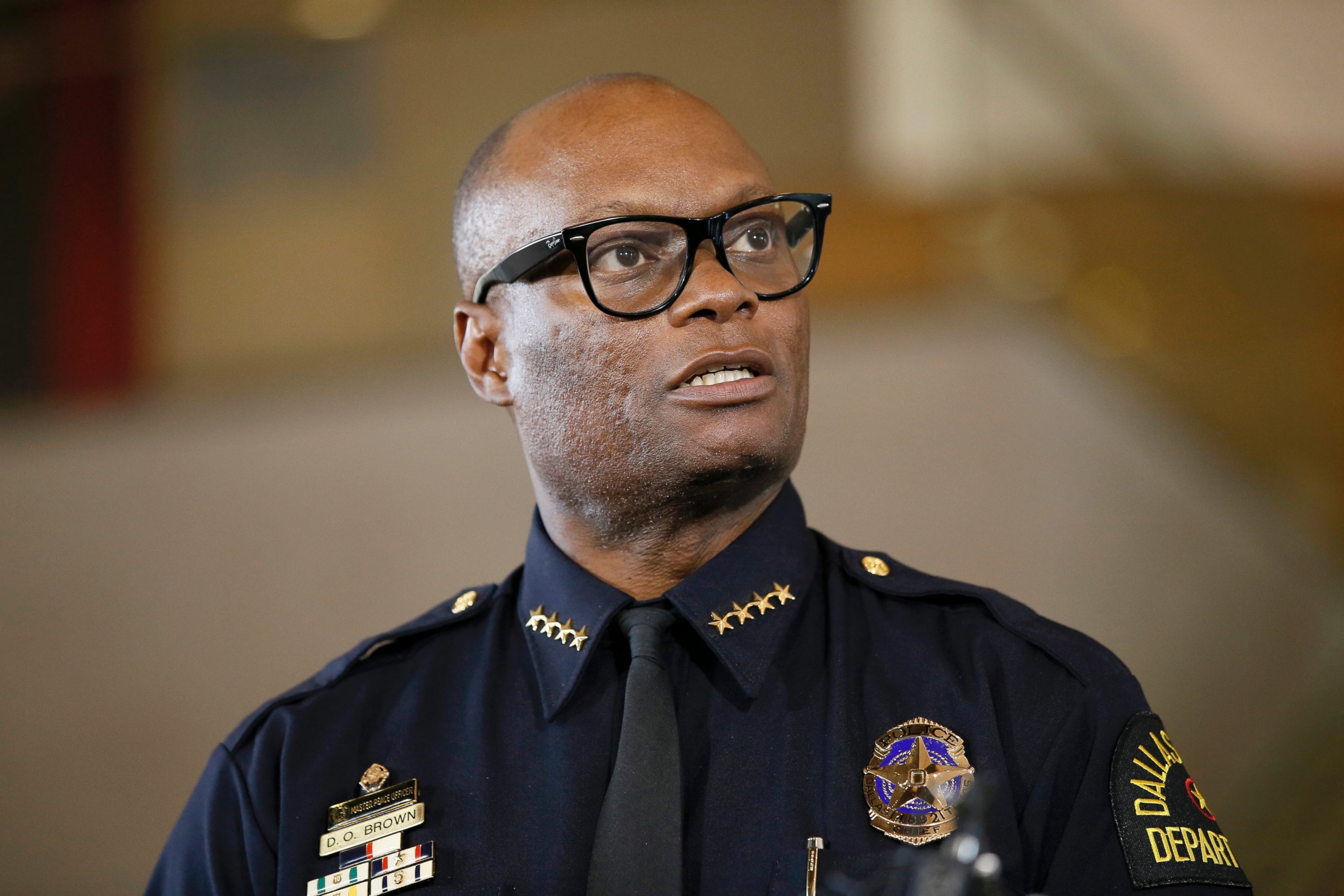 PHOTO: Dallas Police Chief David Brown briefs the media about a shooting at Dallas Police headquarters in Dallas.