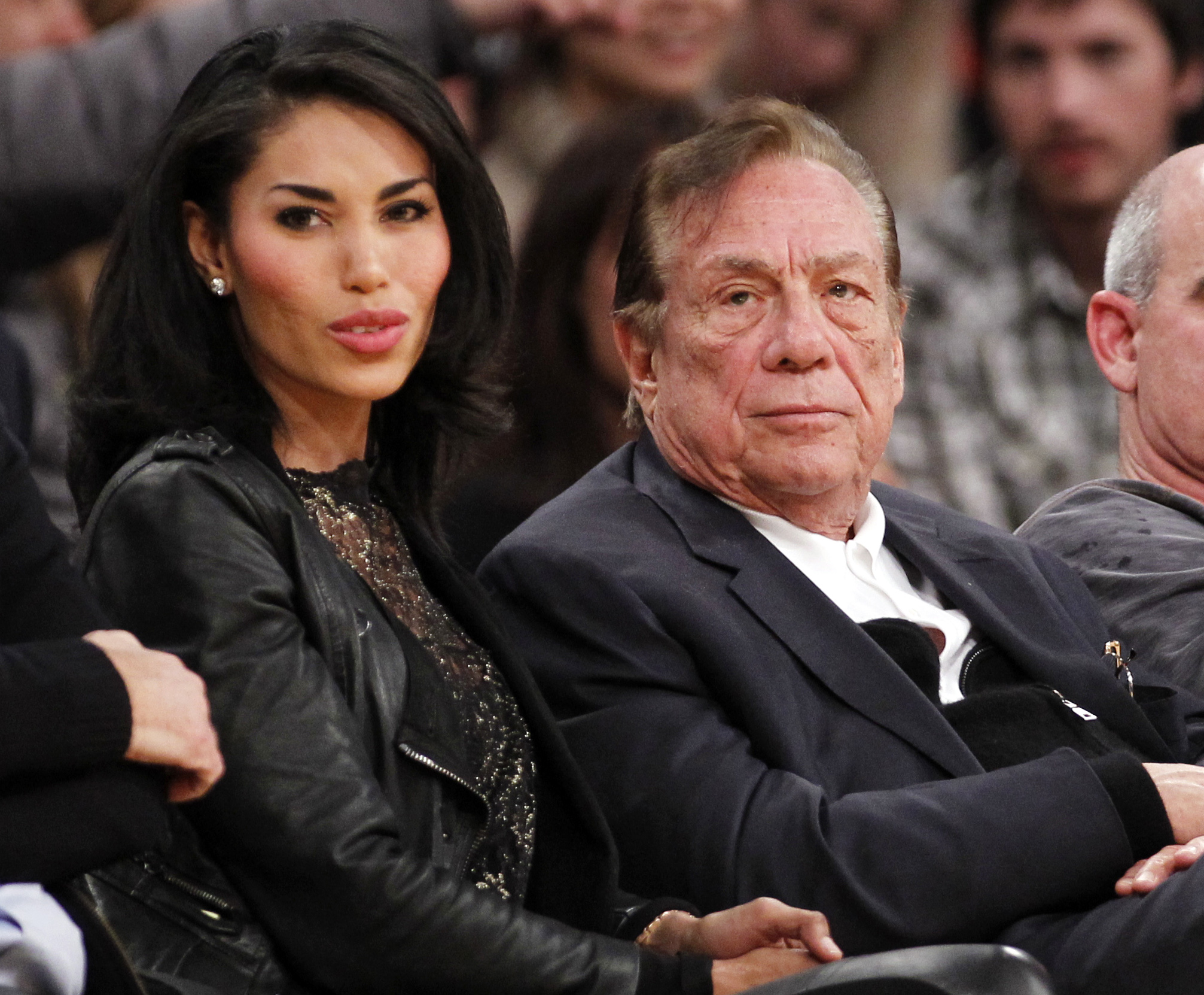 PHOTO: Los Angeles Clippers owner Donald Sterling, third right, sits with V. Stiviano, left, as  they watch the Clippers play the Los Angeles Lakers during an NBA preseason basketball game in Los Angeles, Calif., Dec. 19, 2010.