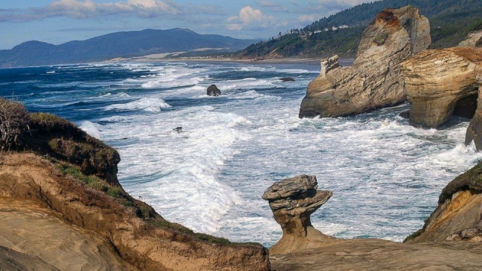 PHOTO: This photo provided by Chelsea Rutherford shows a natural rock formation in Oct. 2008, at Cape Kiwanda State Natural Area which is a state park in Pacific City, Oregon.