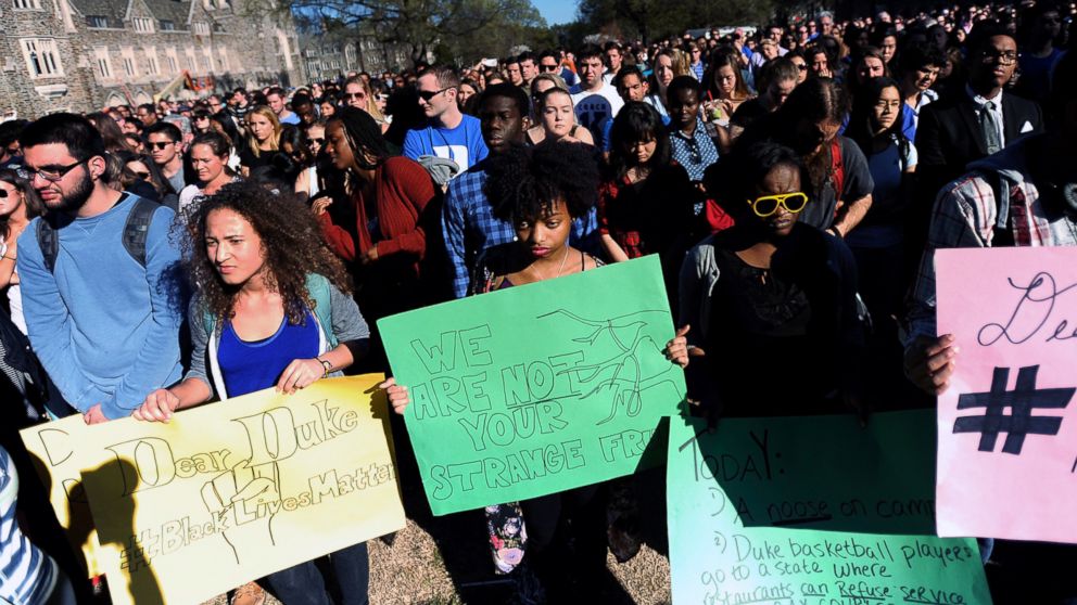 Duke students rally during a university-wide forum outside the Duke Chapel on campus, April 1, 2015, in Durham, N.C.