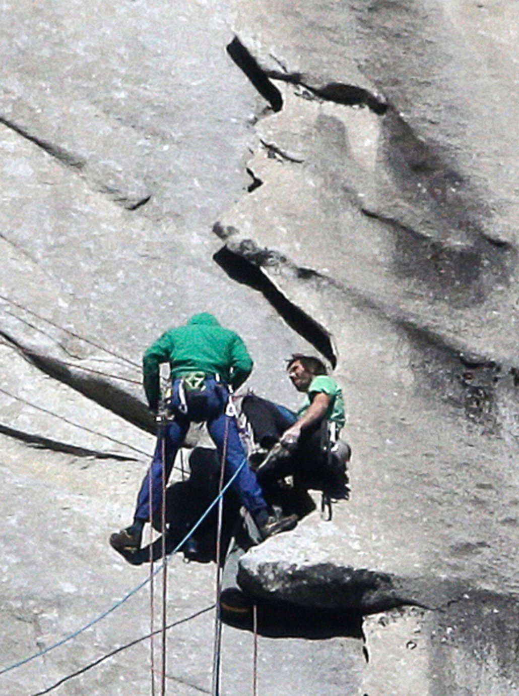 PHOTO: Tommy Caldwell, left, and Kevin Jorgeson near the summit of El Capitan, Jan. 14, 2015, as seen from the valley floor in Yosemite National Park, Calif. 
