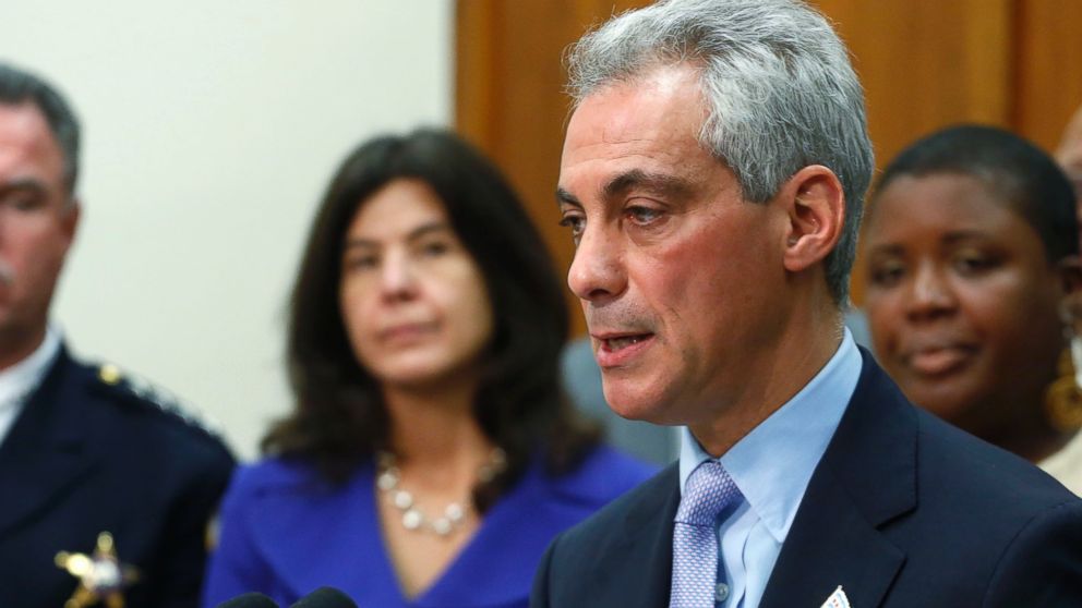 Chicago Mayor Rahm Emanuel, accompanied by Police Superintendent Garry McCarthy and Cook County State's Attorney Anita Alvarez, left, speaks at a news conference attended by families affected by gun violence on Oct. 15, 2013, in Chicago.