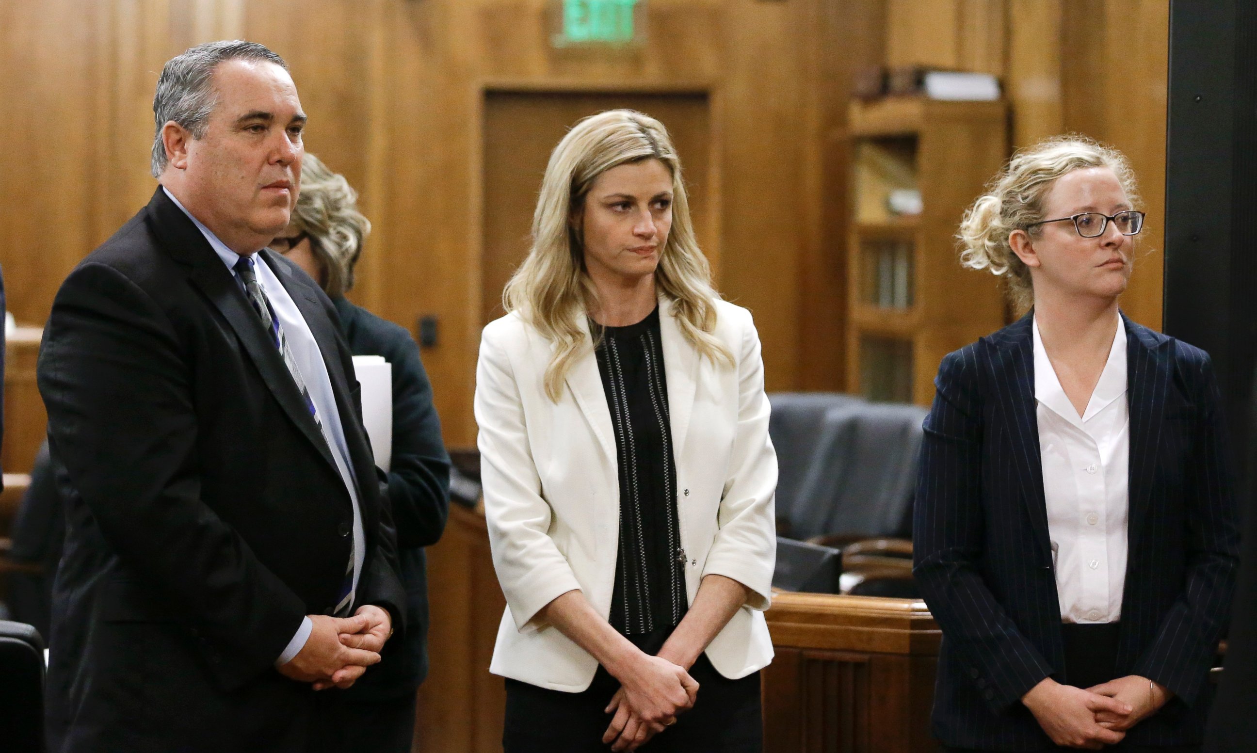 PHOTO: Erin Andrews, center, stands with attorney Scott Carr, left, as the jury leaves the courtroom, Feb. 25, 2016, in Nashville, Tenn. 