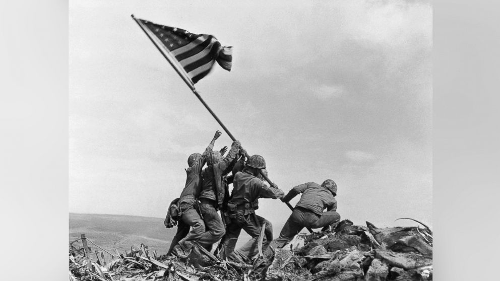 In this Feb. 23, 1945 file photo, U.S. Marines of the 28th Regiment, 5th Division, raise a U.S. flag atop Mount Suribachi, Iwo Jima.