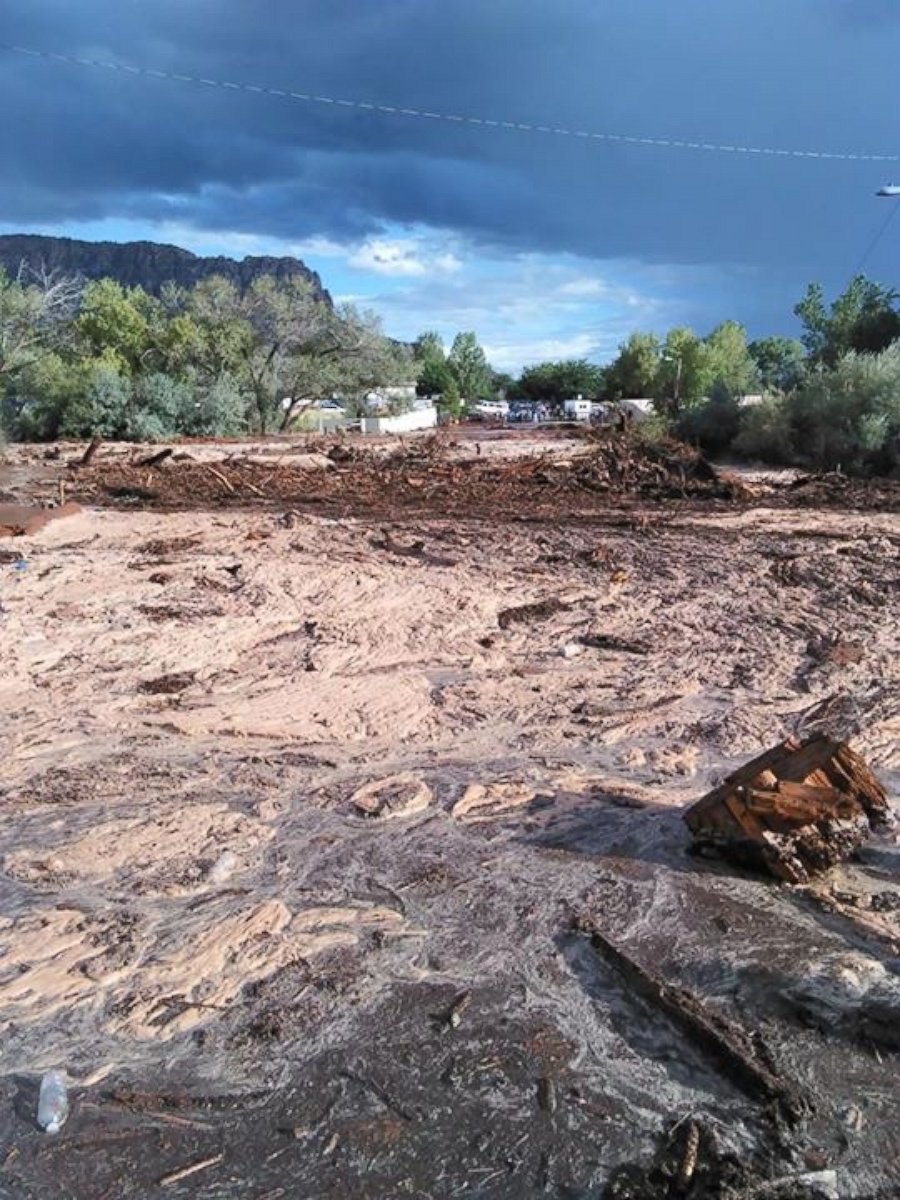 PHOTO:Debris and water cover the ground after a flash flood, Sept. 14, 2015, in Hildale, Utah