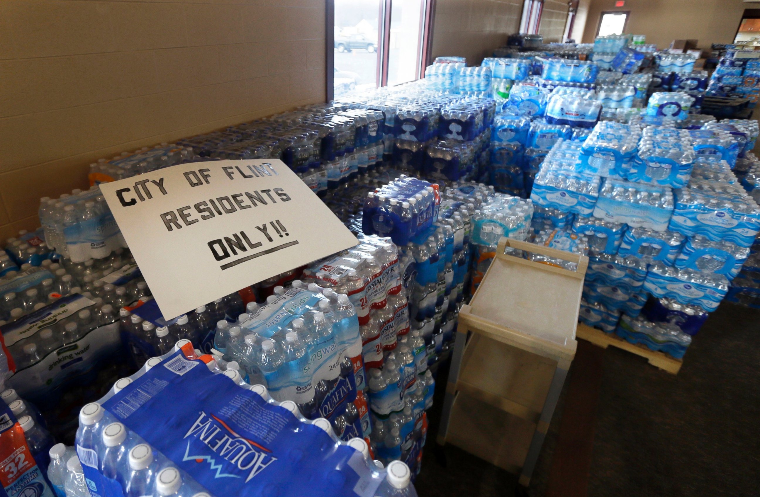 PHOTO: Hundreds of cases of bottled water are stored at Our Lady of Guadalupe Church in Flint, Mich., Feb. 5, 2016.