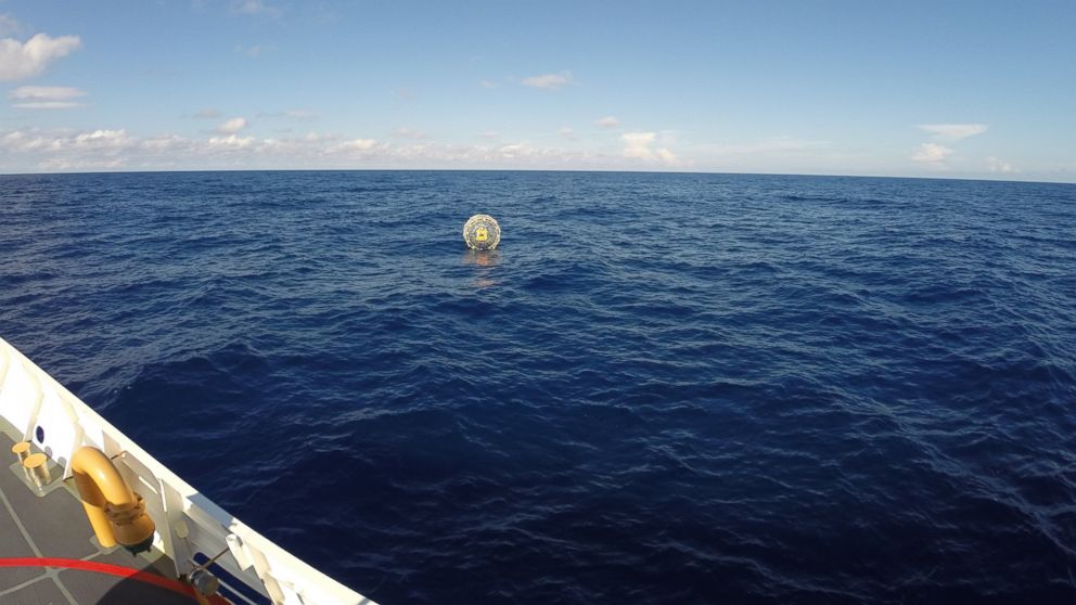 In this Oct. 1, 2014, photo provided by the U.S. Coast Guard, the Coast Guard arrives on scene off the coast of Miami to respond to a report of a man aboard an inflatable hydro bubble who was disoriented. 