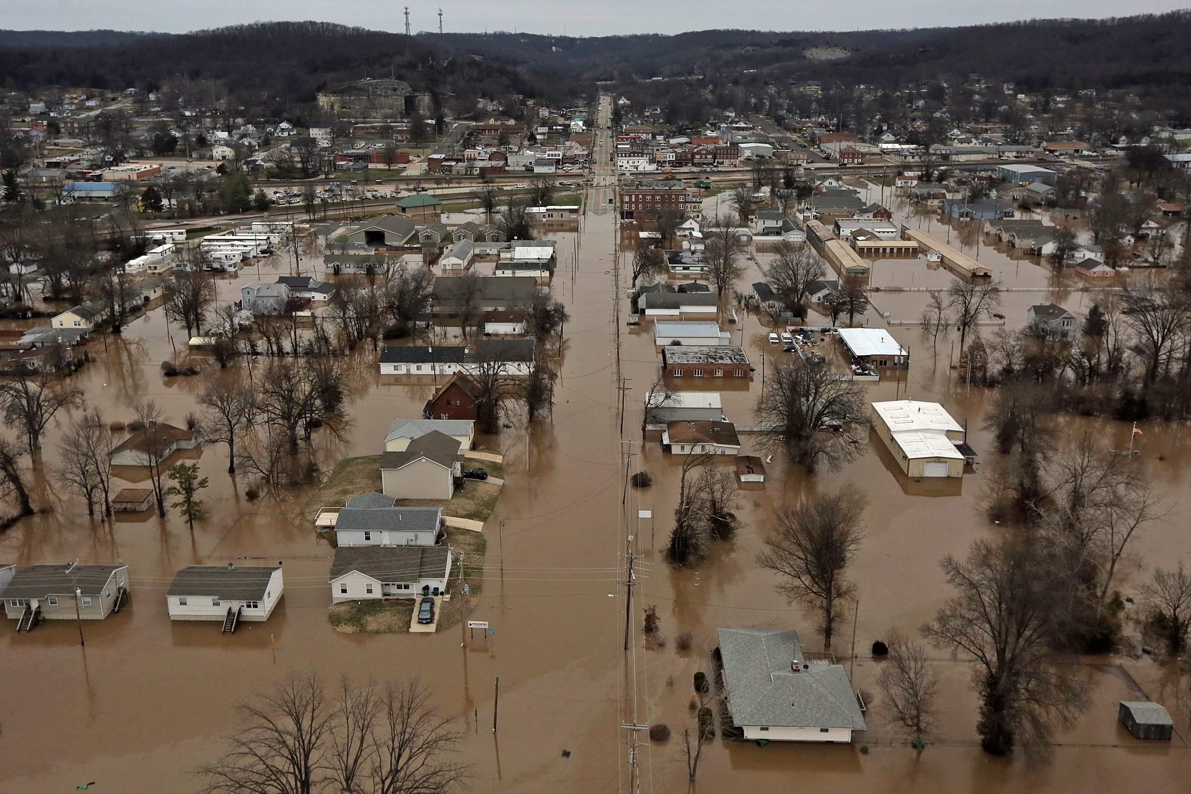 PHOTO: A northern view of 1st Street where homes were flooded, Dec. 29, 2015, in Pacific, Mo. Torrential rains over the past several days pushed already swollen rivers and streams to virtually unheard-of heights in parts of Missouri and Illinois. 