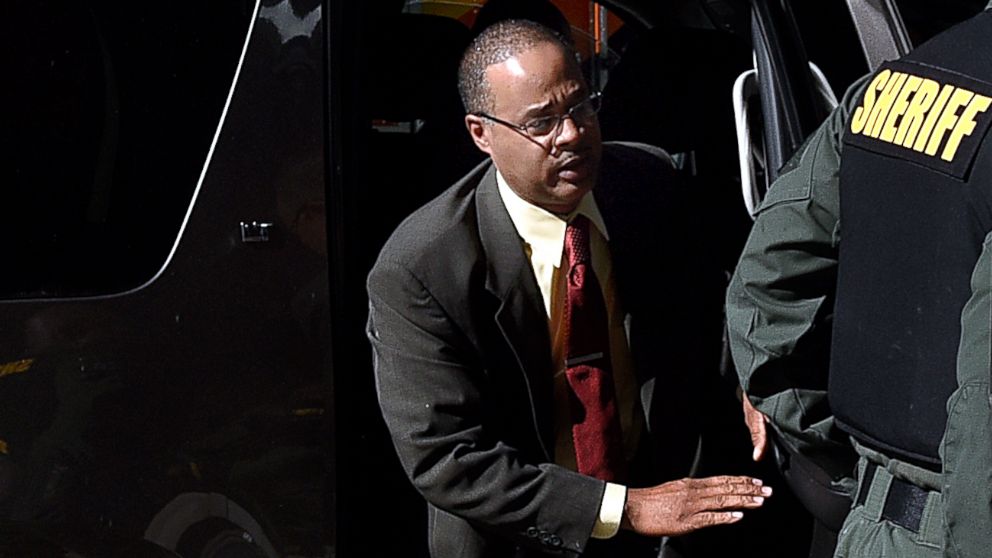 Officer Caesar Goodson arrives at the courthouse,  June 13, 2016, for the third day of his trial in the Freddie Gray case, in Baltimore.  