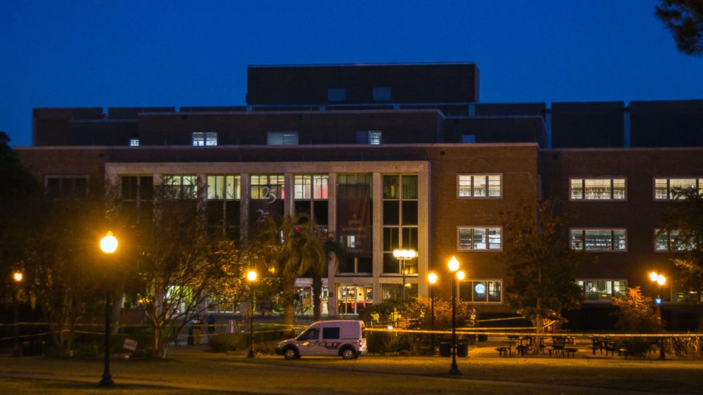 PHOTO: The dawn breaks over a Tallahassee police investigation into the overnight shooting inside and outside the Strozier library on the Florida State University campus in Tallahassee, Fla., Nov 20, 2014.