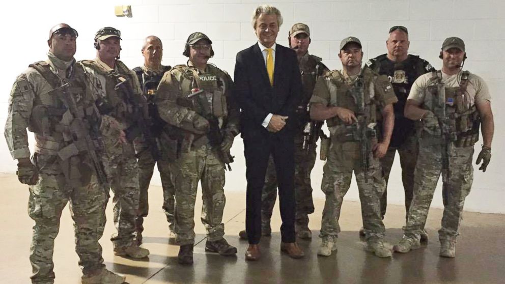 PHOTO: In this photo provided on May 4, 2015 by Geert Wilders, Dutch lawmaker Geert Wilders, leader of the anti-Islam Freedom Party, center, poses for a photograph with police officers.